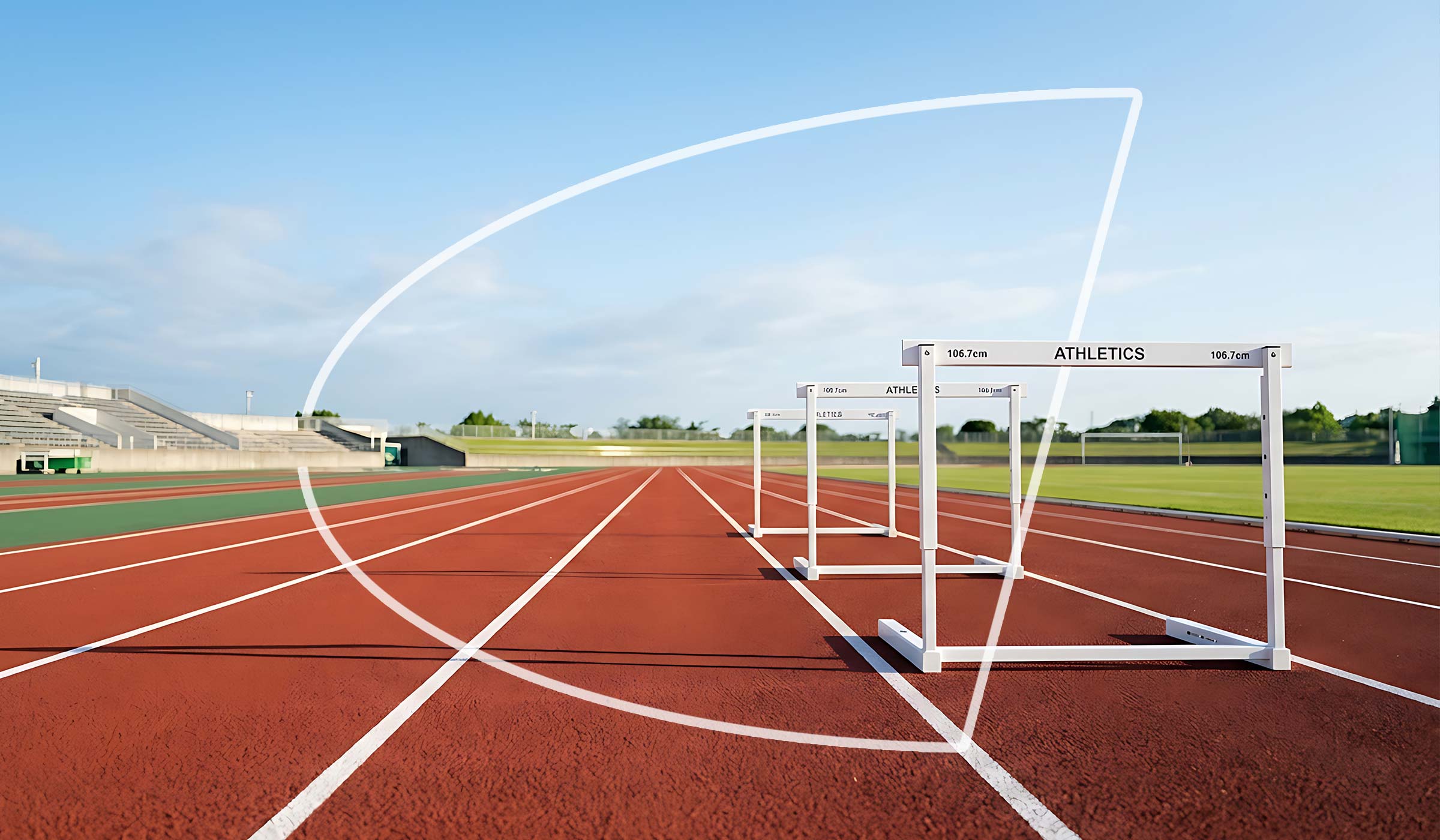 Vallas sobre una pista de atletismo roja en un estadio al aire libre